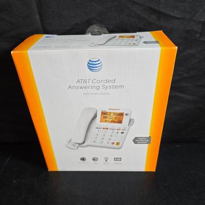 Brand new AT&T Corded answering system - atomic clock - with Notepads - World paper weight - and phone & addresses book