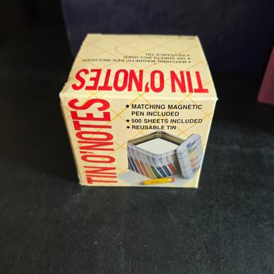 Home office or school supplies - binders - wall clock - clipboard - and an assortment of other office / school supplies.