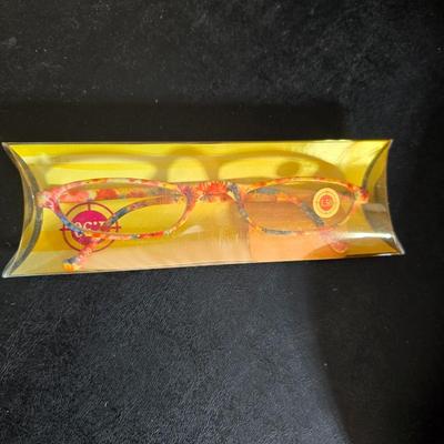 Home office or school supplies - binders - wall clock - clipboard - and an assortment of other office / school supplies.