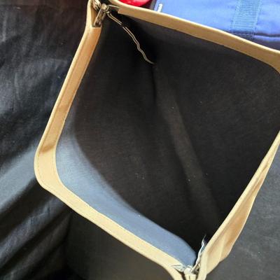 Home office or school supplies - binders - wall clock - clipboard - and an assortment of other office / school supplies.