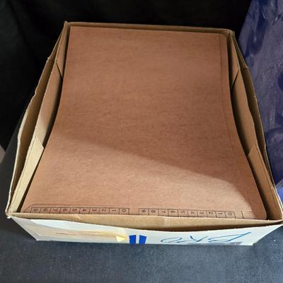 Home office or school supplies - binders - wall clock - clipboard - and an assortment of other office / school supplies.