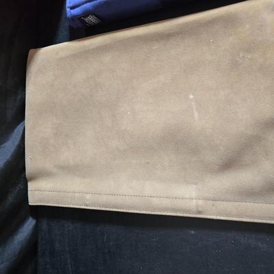 Home office or school supplies - binders - wall clock - clipboard - and an assortment of other office / school supplies.