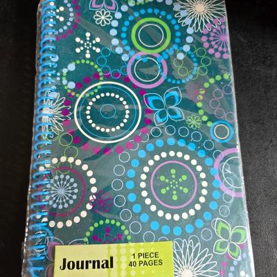 Home office or school supplies - binders - wall clock - clipboard - and an assortment of other office / school supplies.