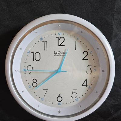 Home office or school supplies - binders - wall clock - clipboard - and an assortment of other office / school supplies.