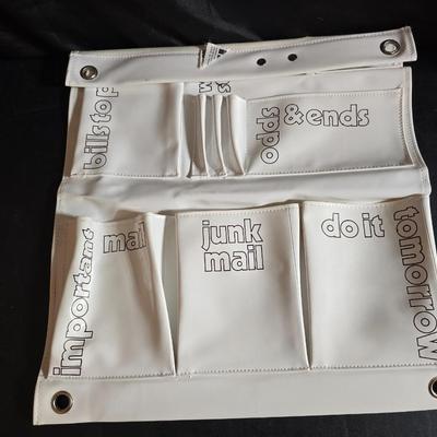 Home office or school supplies - binders - wall clock - clipboard - and an assortment of other office / school supplies.