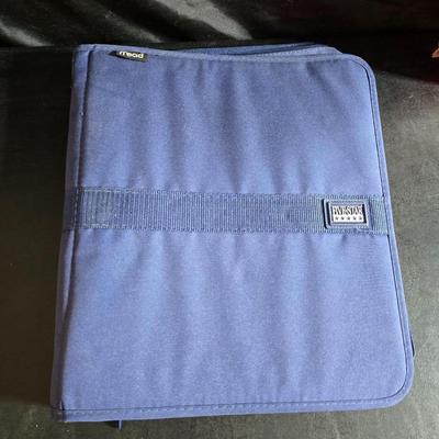 Home office or school supplies - binders - wall clock - clipboard - and an assortment of other office / school supplies.