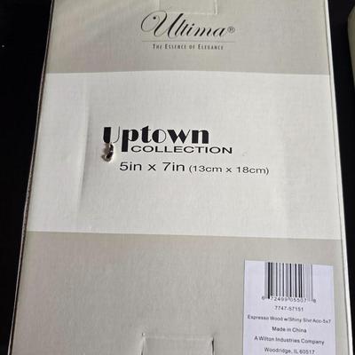 Four brand new matching picture frames with magnetic photo album and two candle holders