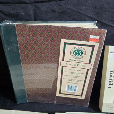 Four brand new matching picture frames with magnetic photo album and two candle holders