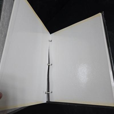 A variety of picture frames and a magnetic photo album