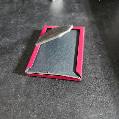 A variety of picture frames and a magnetic photo album