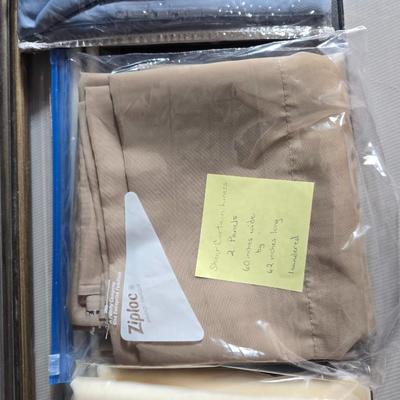 New curtain rods with sheer curtain panels and a new one rod pocket panel