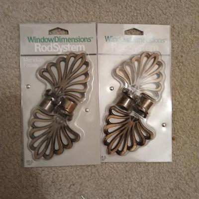 New curtain rods with sheer curtain panels and a new one rod pocket panel