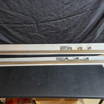 New curtain rods with sheer curtain panels and a new one rod pocket panel