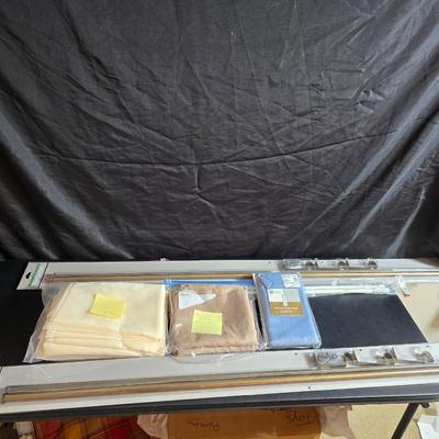 New curtain rods with sheer curtain panels and a new one rod pocket panel