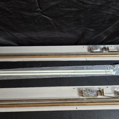 New curtain rods with sheer curtain panels and a new one rod pocket panel