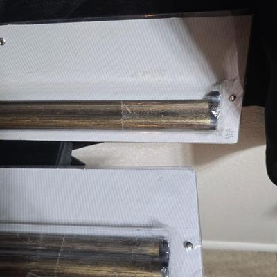 New curtain rods with sheer curtain panels and a new one rod pocket panel