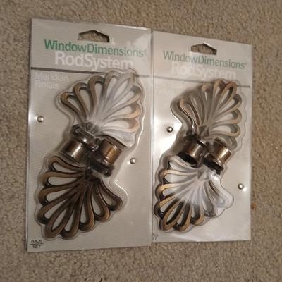 New curtain rods with sheer curtain panels and a new one rod pocket panel