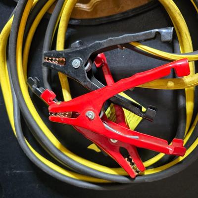 Jumper cables and a vehicle banket with a visor pen holder and more