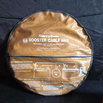 Jumper cables and a vehicle banket with a visor pen holder and more