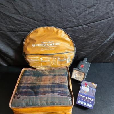 Jumper cables and a vehicle banket with a visor pen holder and more