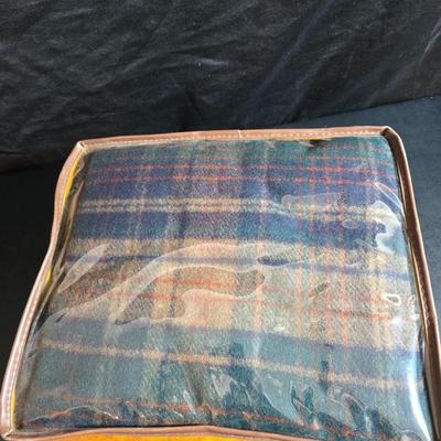 Jumper cables and a vehicle banket with a visor pen holder and more