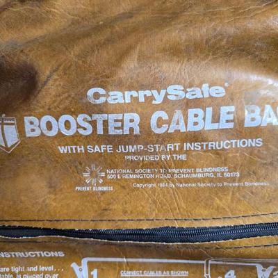 Jumper cables and a vehicle banket with a visor pen holder and more