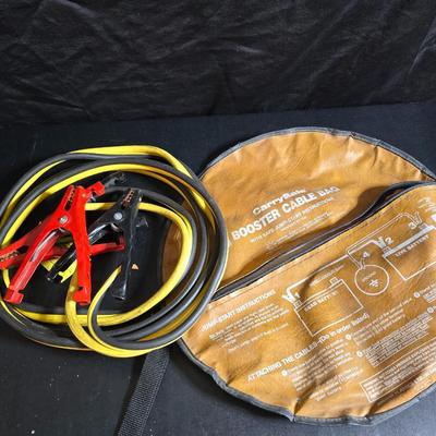 Jumper cables and a vehicle banket with a visor pen holder and more