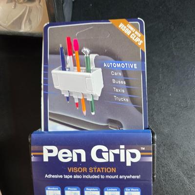 Jumper cables and a vehicle banket with a visor pen holder and more