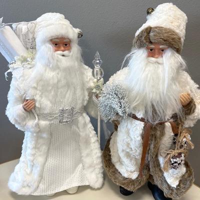 Two white fur coat Santa’s decor