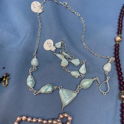 Sale Photo Thumbnail #127: The one necklace & bracelet is Larimar!  They are as is.  The other necklaces are in good condition.