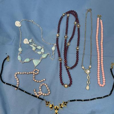 Sale Photo Thumbnail #124: The one necklace & bracelet is Larimar!  They are as is.  The other necklaces are in good condition.