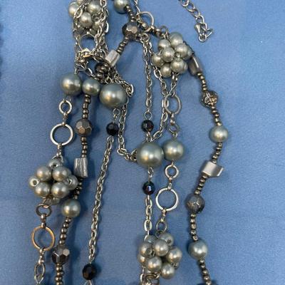 Sale Photo Thumbnail #172: Don't know the maker.  The little baggie has matching earrings.