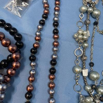 Sale Photo Thumbnail #171: Don't know the maker.  The little baggie has matching earrings.