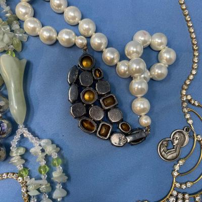 Sale Photo Thumbnail #180: Pretty neat group!  The green necklace is stone.