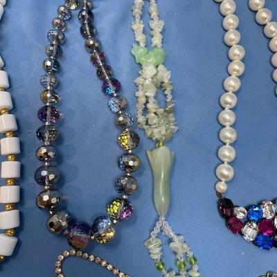 Sale Photo Thumbnail #176: Pretty neat group!  The green necklace is stone.