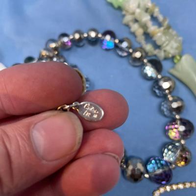 Sale Photo Thumbnail #179: Pretty neat group!  The green necklace is stone.