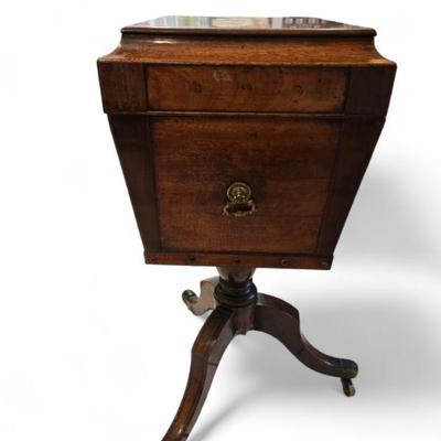 19th C. grand Mahogany teapoy on casters. 
