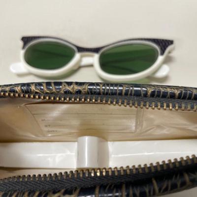 Vintage plastic sunglasses in zipper case