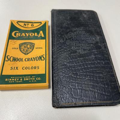 Vintage crayola crayons and Webster’s pocket dictionary