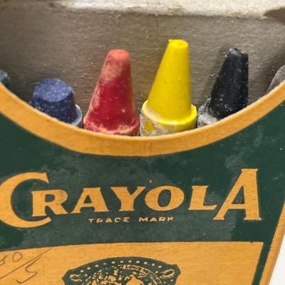 Vintage crayola crayons and Webster’s pocket dictionary