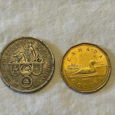 1955 EASTERN CARIBBEAN STATES 50 CENT COIN. 1988 CANADIAN “LOONIE” ONE DOLLAR COIN