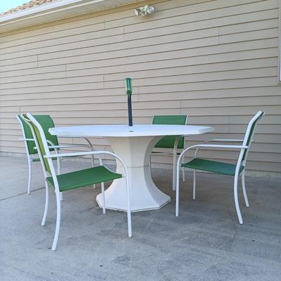 LOT 4: Plastic Octagonal Patio Table with Metal Chairs