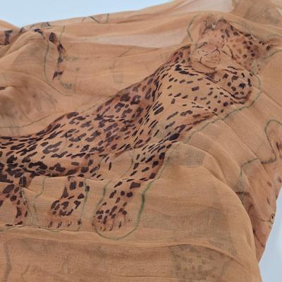 LOT 28: Metallic Gold Colored Handbag, Purple Sequined Scarf, Animal Print Scarf, and More Fashionable Scarves