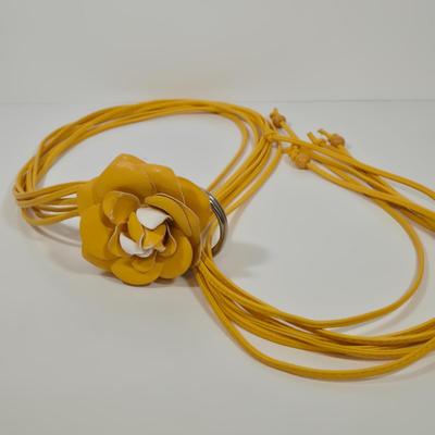 LOT 46: Eel Skin Shoulder Bag, Flower Patterned Handbag, Gold-tone Sequined Hobo Bag, and Multiple Stylish Belts Including Macrame,...