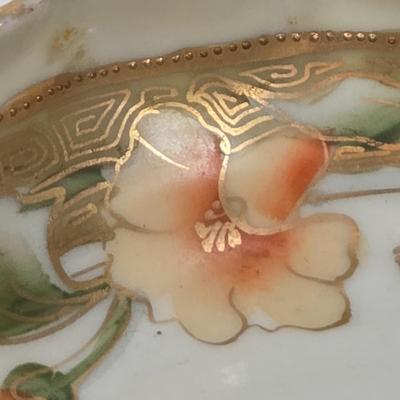 LOT 49: Round Table with Tablecloth, Lamp, Hen Feathers Bud Vase, and Hand-Painted Nippon Trinket Bowl