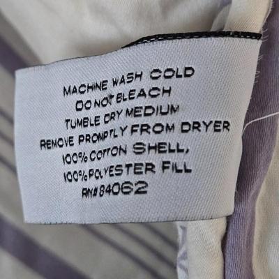 LOT 52: Bella Lux Fine Linens Reversible Comforter and Two Matching Throw Pillows