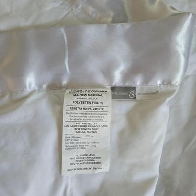 LOT 54: United Feather and Down Pink Comforter, White Hollander Comforter. Sage Green Comforter, and Pink Mainstays Blanket