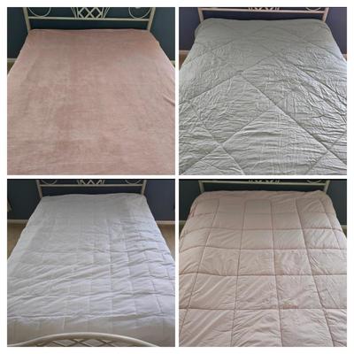 LOT 54: United Feather and Down Pink Comforter, White Hollander Comforter. Sage Green Comforter, and Pink Mainstays Blanket