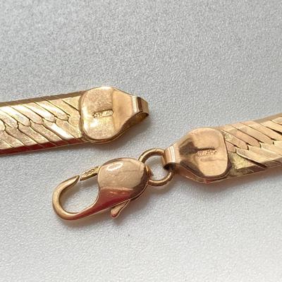 LOT 62: Italy Gold Herringbone Chain Necklace - 14KT / 585, TW 21.33g, 14"