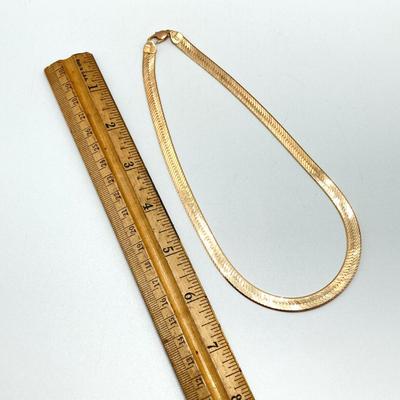 LOT 62: Italy Gold Herringbone Chain Necklace - 14KT / 585, TW 21.33g, 14"